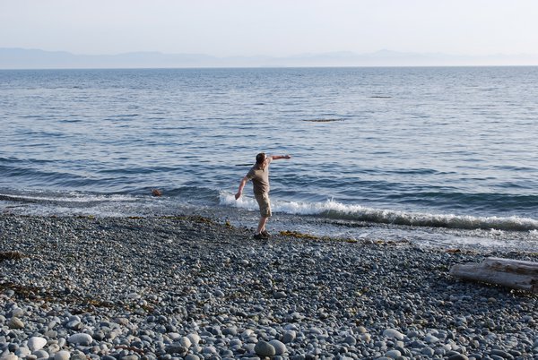 Mike skipping stones at French Beach