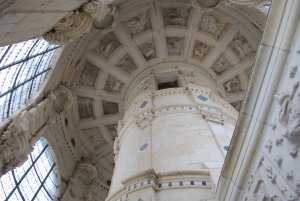 Looking up at a staircase leading to the roof of Chateau de Chambord