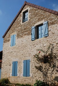 Blue shutters in Chateauneuf-en-Auxois