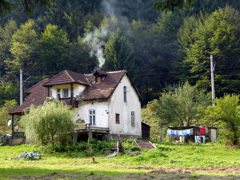 House on the edge of the forest on the road between Sinaia and Brasov