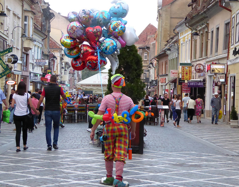 Clown in the old city center of Brasov