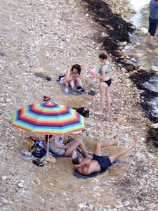 Just some small strips on beach in Ortigia, people also swim off the rocks