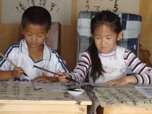 Kids Practicing Caligraphy