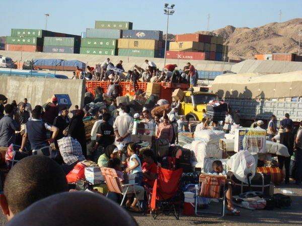 Crowds waiting to get ferry to Egypt