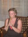Lizzy trying to play the flute