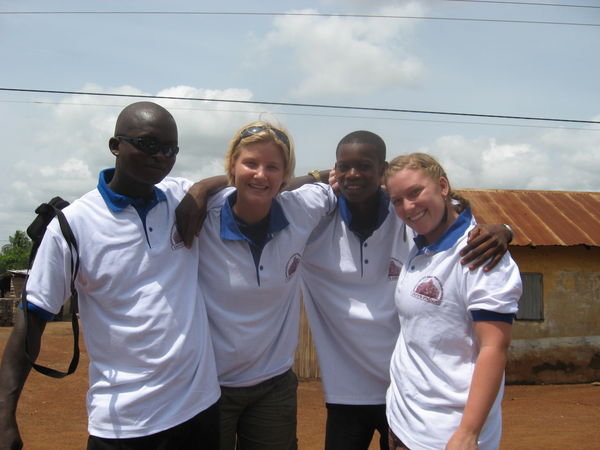 Me, Lizzy, Maxwell, and the guy selling the t-shirts in the village
