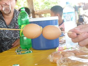 LAOS: Vientiane - Eggs on a stick!