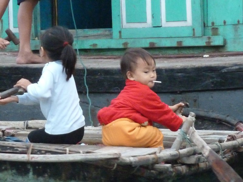Kids in floating fishing village