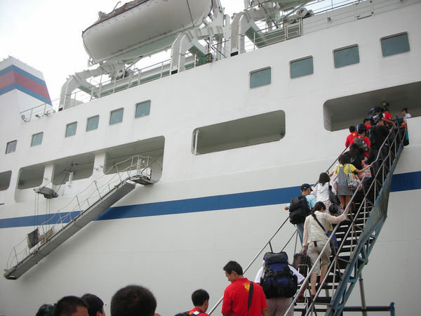 Boarding the ferry to Japan