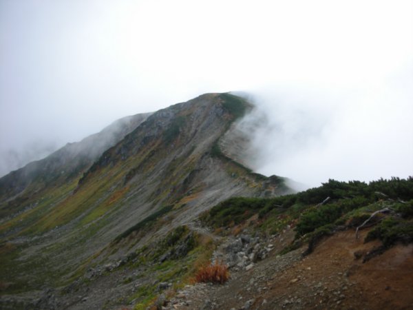 Clouds coming over the ridge
