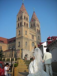Newly wed in front of St Michael's church
