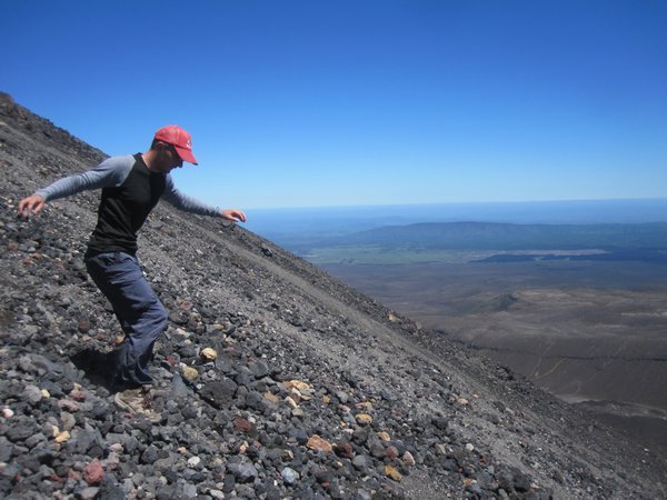 Skidding down the loose gravel in steep Mt. Ngauruhoe