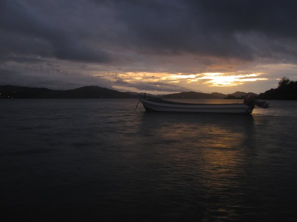 Boat at sunset on Nananu-i-ra