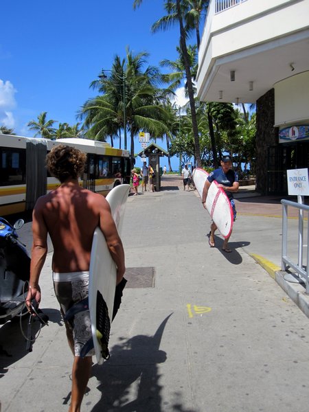 Surfers near Waikiki Beach in Honolulu
