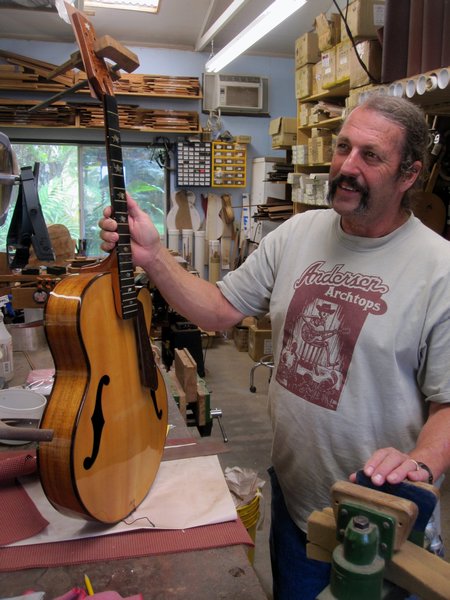 Bob with one of the guitars he made | Photo