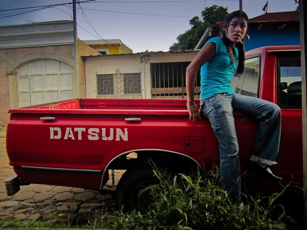 Young girl on pick-up truck in Ataco