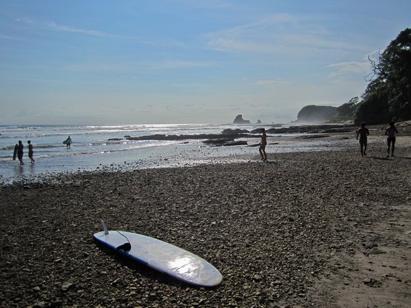 Surfers at Maderas Beach near San Juan