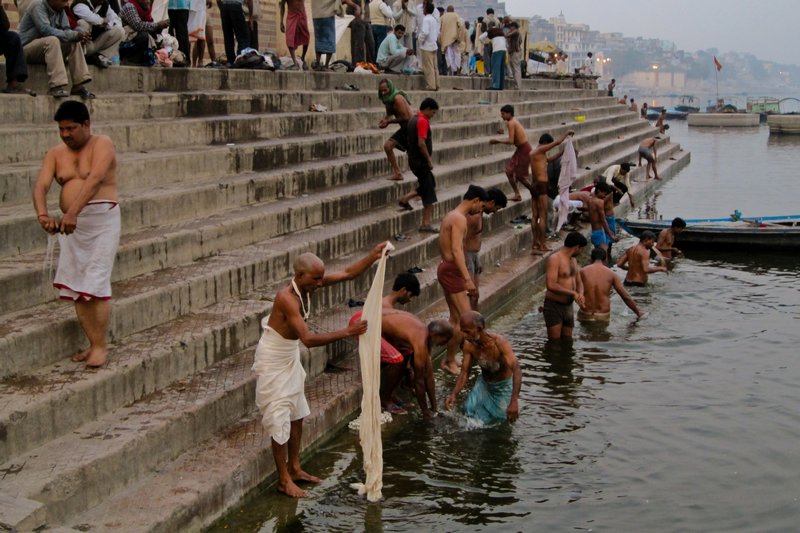 Pilgrims bathing in the Ganges in Varanasi