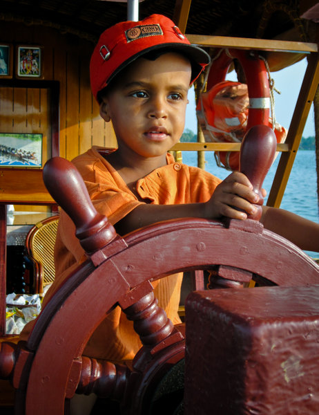 Captain Luc steering our houseboat