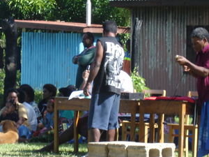 headmaster being presented with kava