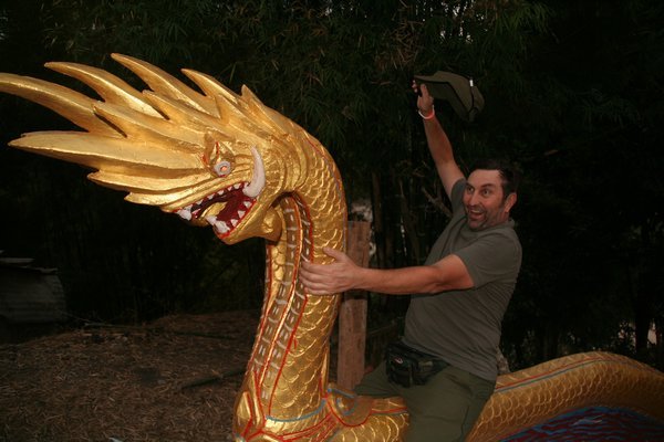 Ridin' the dragon in Lao.
