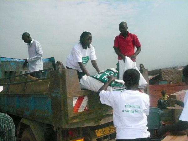 unloading truck for Touch Namuwongo outreach 5th jULY