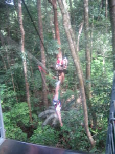 Nina upside down canopy surfing in Cape trib