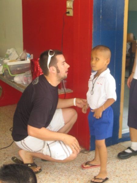 Mike and one of the blind kids