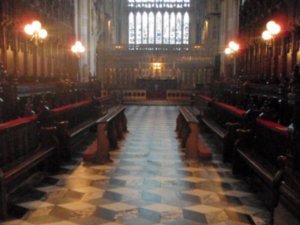 the choir chairs bit,  the organ is above us, and the floor is marble, 