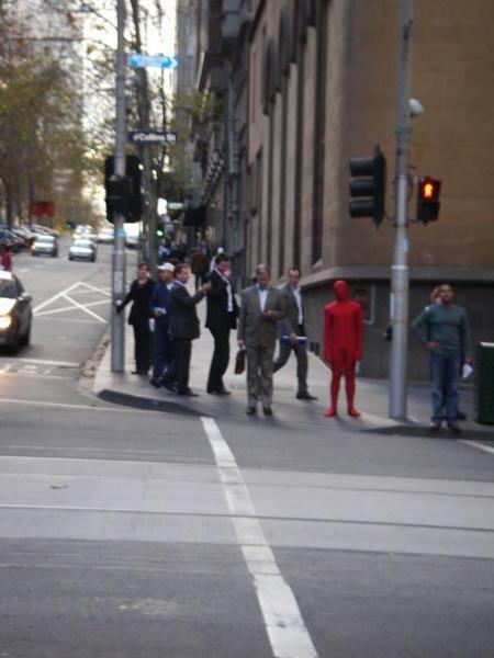 Weird Bloke dressed in Red being filmed in Melbourne
