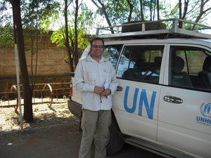 Al with a UNHCR vehicle