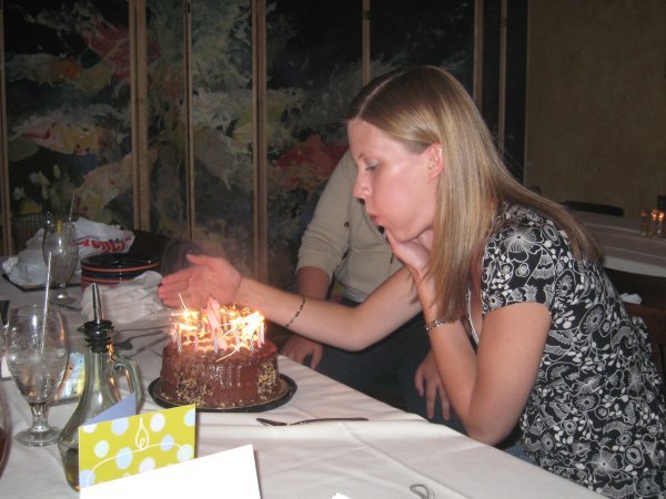 Leanne still trying to blow the candles out