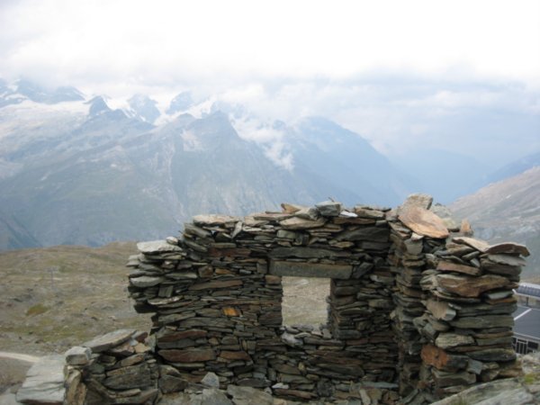 Remains of rock shelter in Swiss Alps