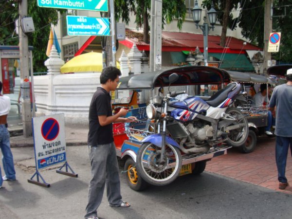 Motor scooter in a tuk tuk