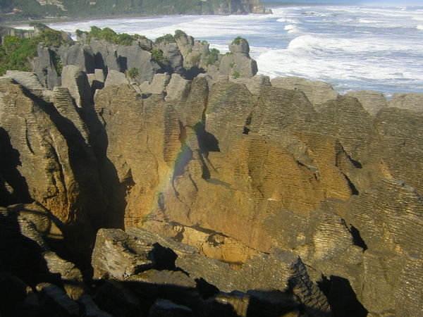Rainbow at Pancake Rocks
