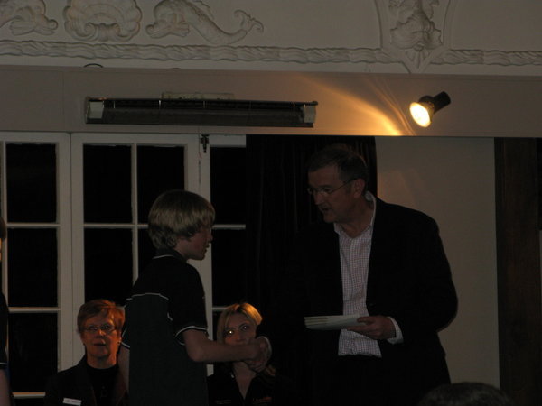 Receiving his prize!
