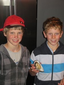 Avery and Jonte and one of the yummy mussels we caught and ate each night.