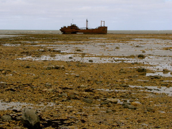The Ithaca sits on the tidal flats.