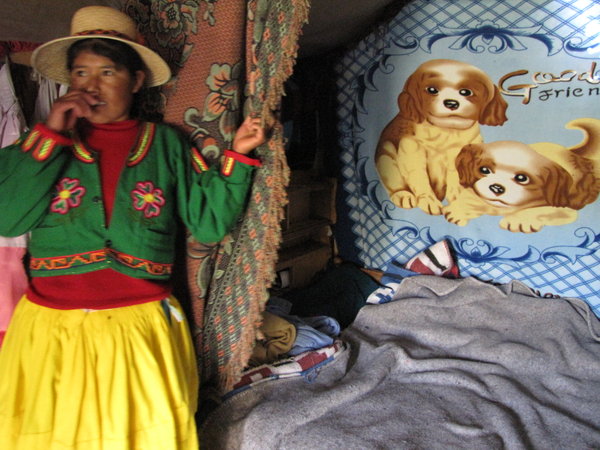 inside a house on the floating island, this lady loves puppies