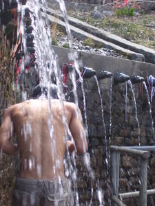  Dipu taking shower at 108 holy spring water