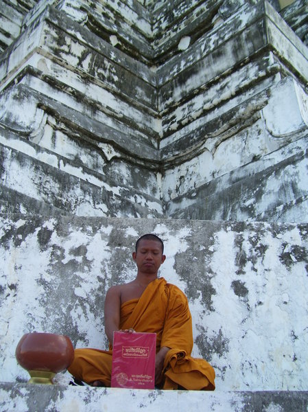 a monk meditated in old temple