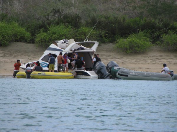 galapagos - sinking boat makes shoreline