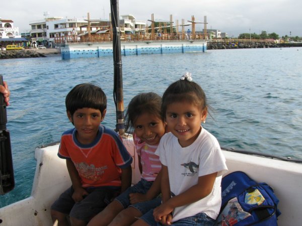 galapagos - do you envy these kids growing up takeing boats to school