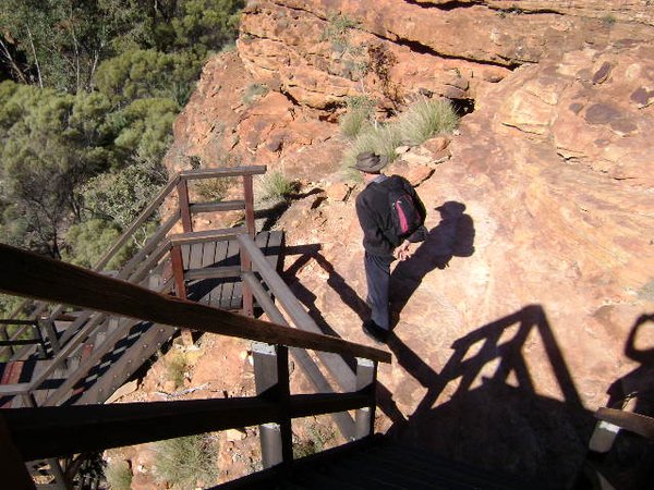 Graham climbing down the bridge