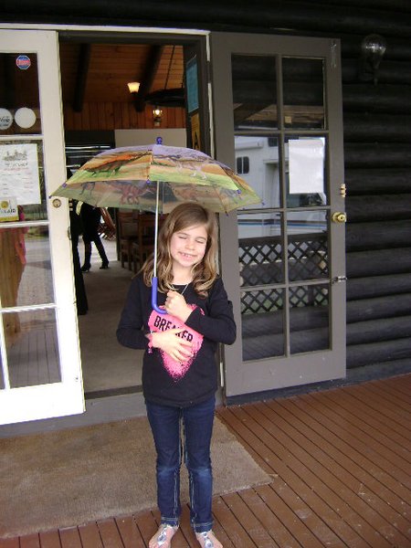 Jamie with her Dinosaur Umbrella