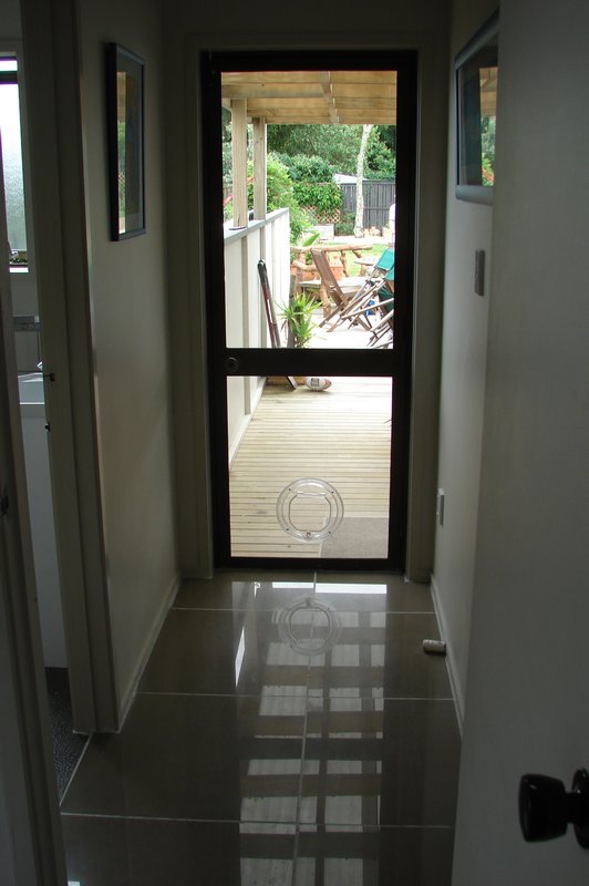Looking down the new tiled hallway.