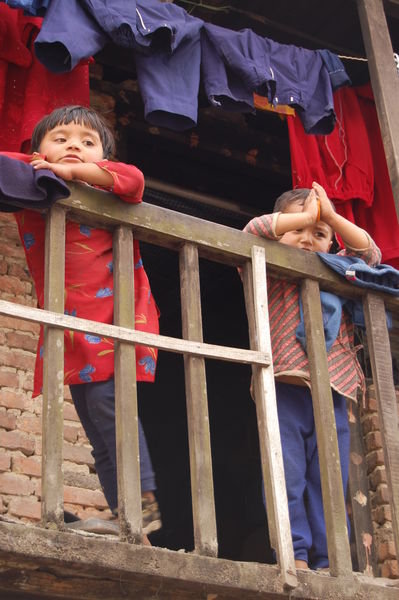 kids on a balcony