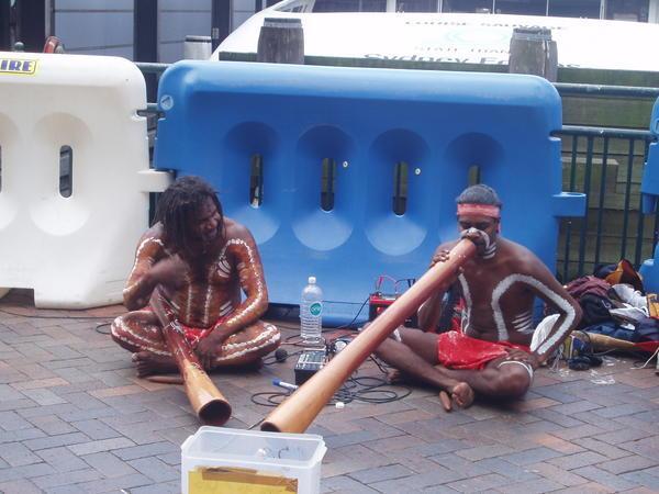 aboriginals playing didgeridoo