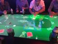 Automated poker table