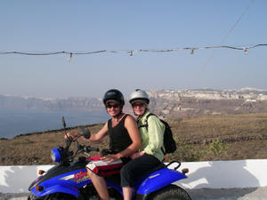 Mum and Luke on their quad bike